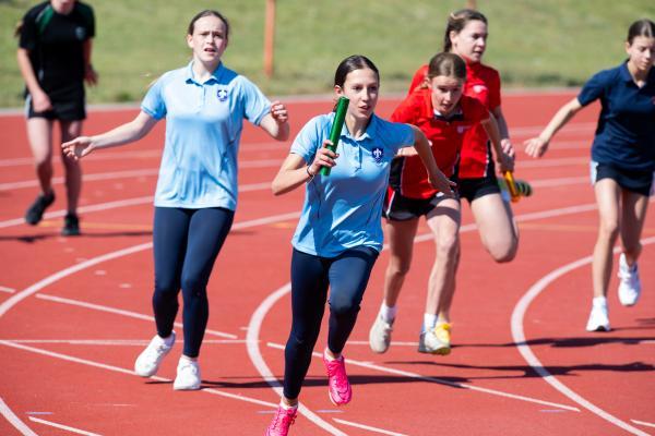 Athletics at the track at FB Fields. Schools athletics cup - girls year 7/8 4 x 100m relay, last leg changeover. Beaulieu who won. Ella Duarte (13) on the last leg                              Picture: ROB CURRIE