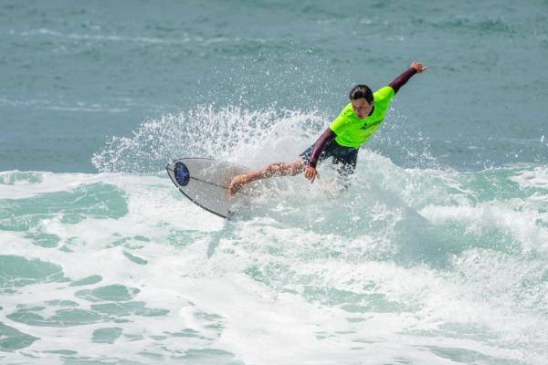 Surfing, St Ouen's Bay, Watersplash. Round 1 of 4 of the Jersey Surfboard Club junior division summer series. Green vest Oscar Godden (15)                       Picture: ROB CURRIE