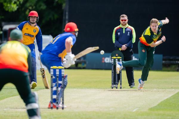 Cricket at Farmers Field.  St Ouen (batting) V Farmers (bowling).  Scott Van Breda bowling to Harrison Carlyon (Dom Blampied on far left)             Picture: ROB CURRIE