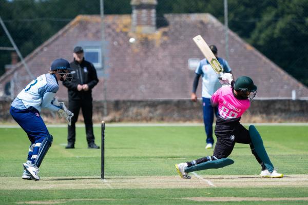 Cricket at Grainville. First game of the Belasko Channel Island league, 45 overs a side, Griffins (batting) (from Guernsey)  V Walkovers (bowling). L>R Sam Gott, wicket keeper and Marcus Thomas is caught from this ball by Nick Ferraby (not pictured)                 Picture: ROB CURRIE