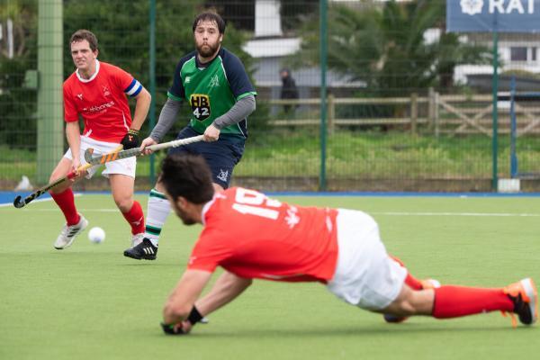 Hockey Jersey Men v Sunburry & Walton Tom Millar awaits the crossed ball to score Jersey's first goal Picture: JON GUEGAN