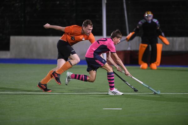 Hunters Tom Coward and lions Jake le Boutillier Div 2 Hockey Lions v Hunters Picture: DAVID FERGUSON