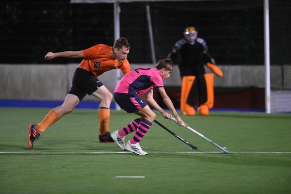 Hunters Tom Coward and lions Jake le Boutillier Div 2 Hockey Lions v Hunters Picture: DAVID FERGUSON