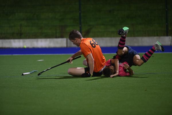 Hunters Tom Coward and lions Jake le Boutillier Div 2 Hockey Lions v Hunters Picture: DAVID FERGUSON