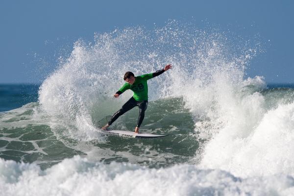 Surfing at St Ouen. GB Cup competition. Men's Open Semi Final. Max Bennett of Channel Islands (GREEN)                    Picture: ROB CURRIE