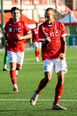 Football at Springfield. Chipstead (green) V Jersey Bulls (red). Karl Hinds celebrates after scoring the first goal for Jersey in the first half, minutes before half time                       Picture: ROB CURRIE