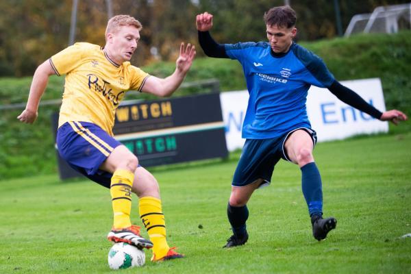 Football Grouville v St Clement 8 Darren Coyle and and 17 Charles Stewart  Picture: JON GUEGAN